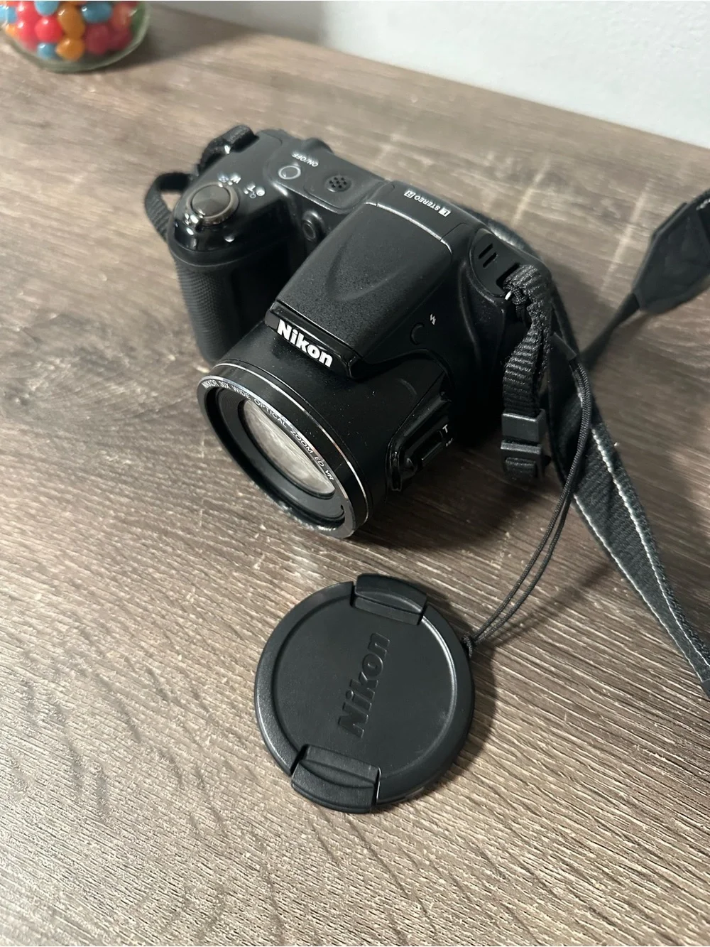 Nikon Black Compact Bridge Camera with Detachable Lens Cap